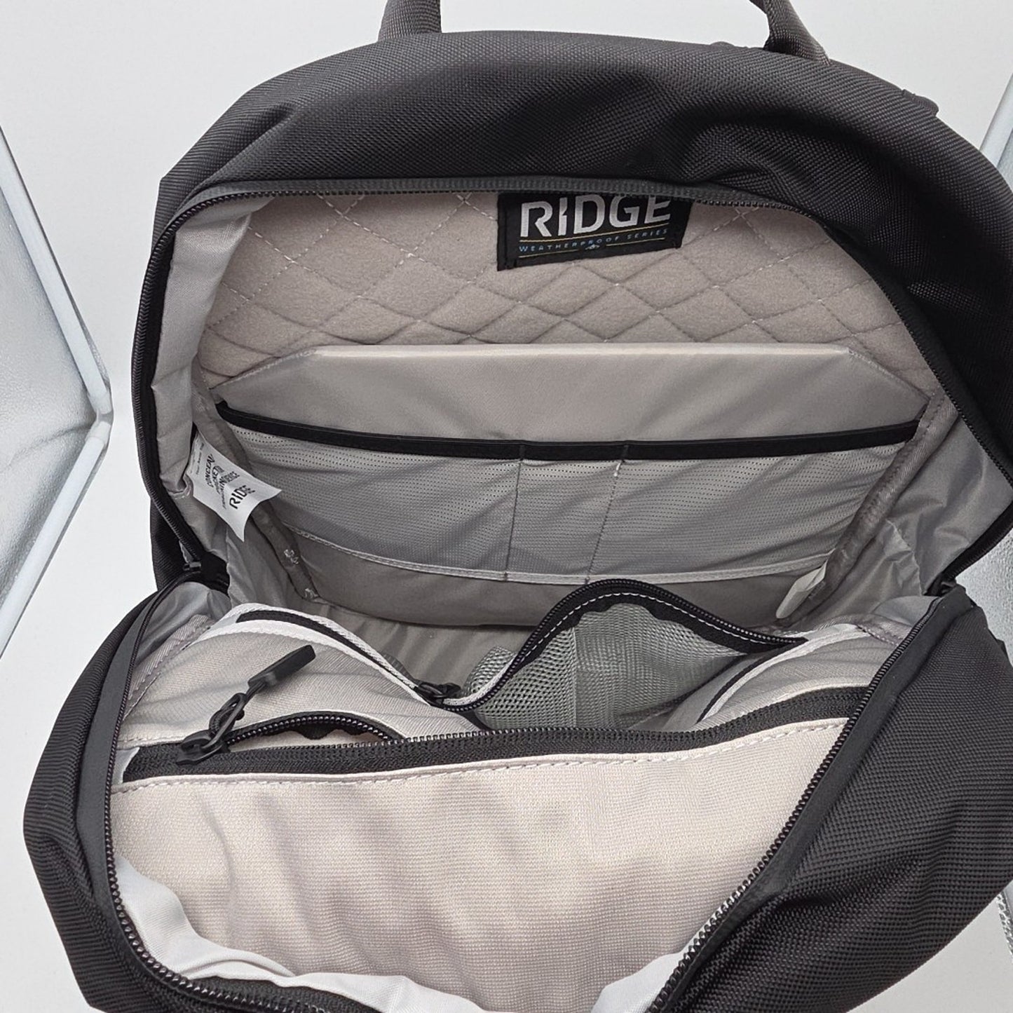 The Ridge Commuter Backpack Black Waterproof RFID Laptop Sleeve Unisex