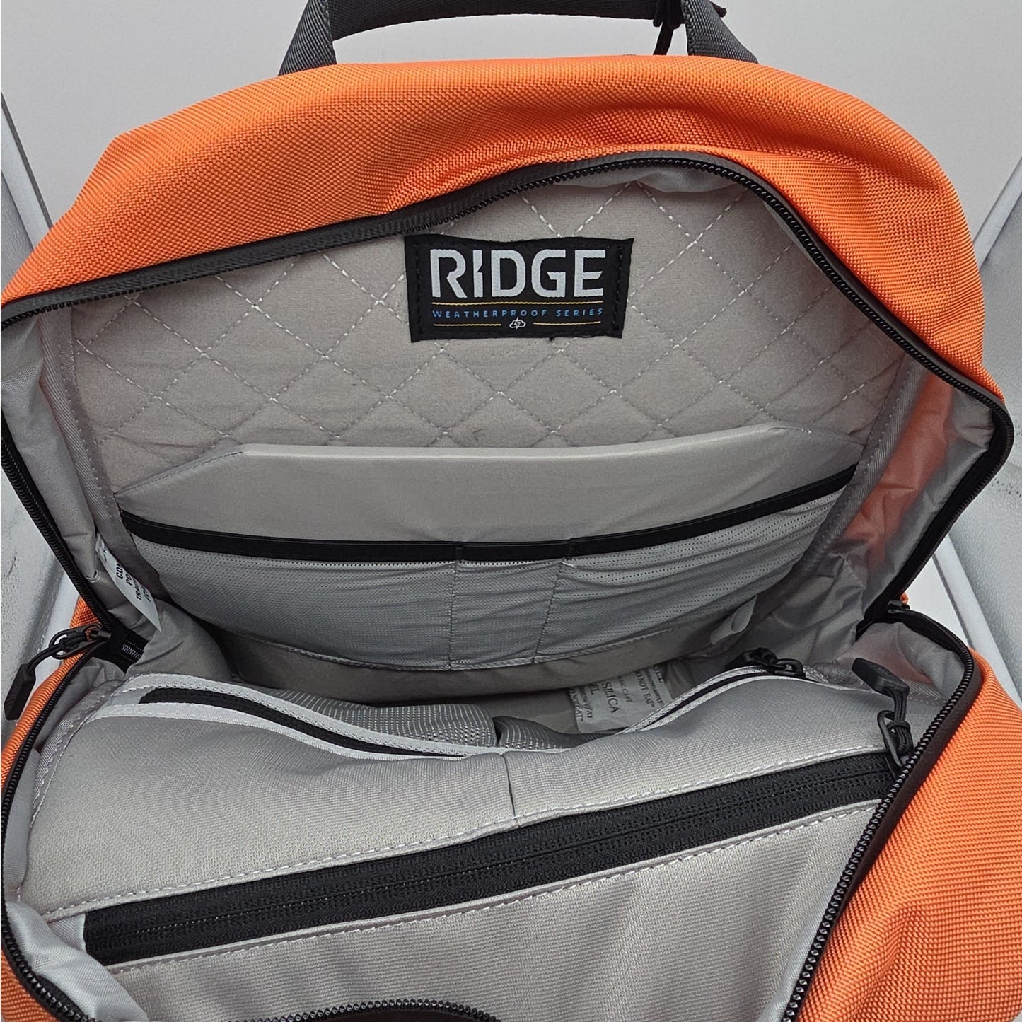 The Ridge Wallet - Commuter Backpack - Basecamp - Orange 18L T0375